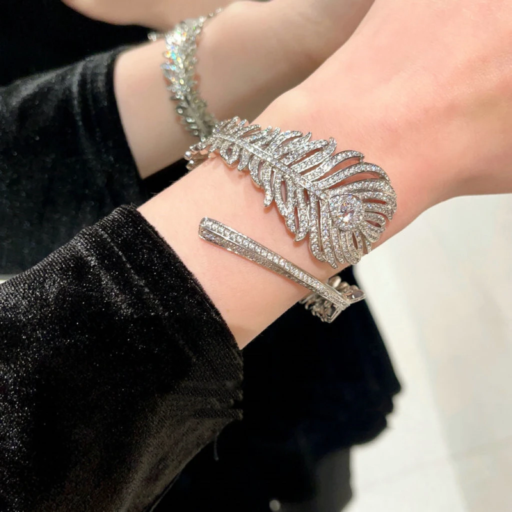 铜合金合成锆石手镯 P022 宝诗羽毛白色手镯