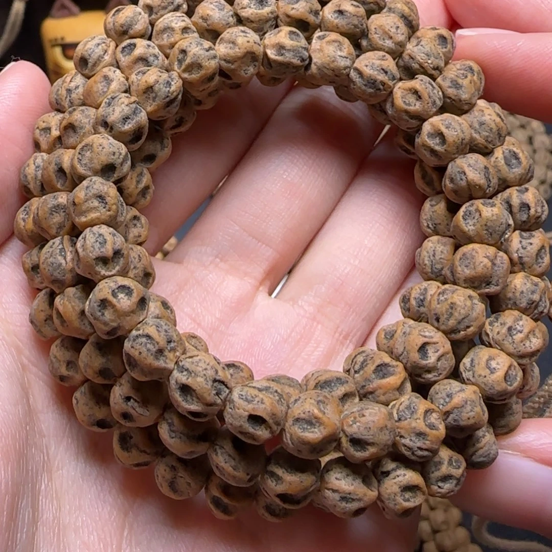 雪***孩柏香籽/百香籽吊坠