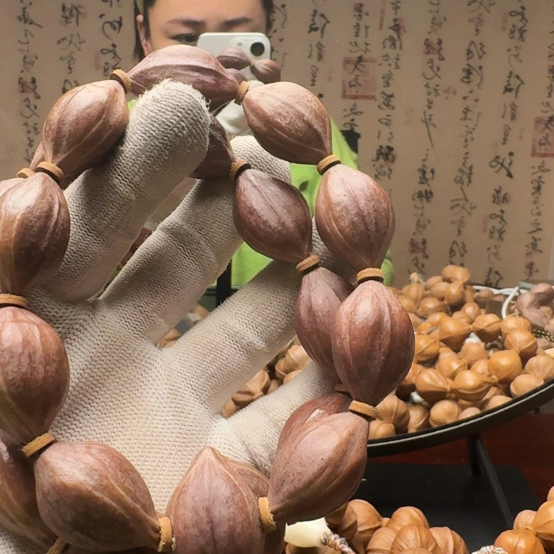 橄榄核把件紫皮核