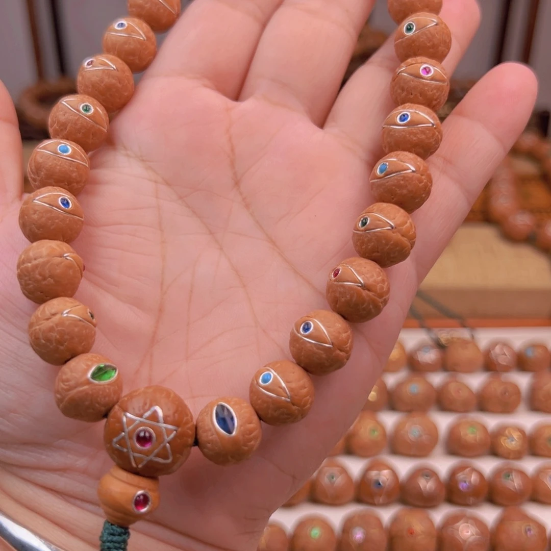 凤眼菩提吊坠手持