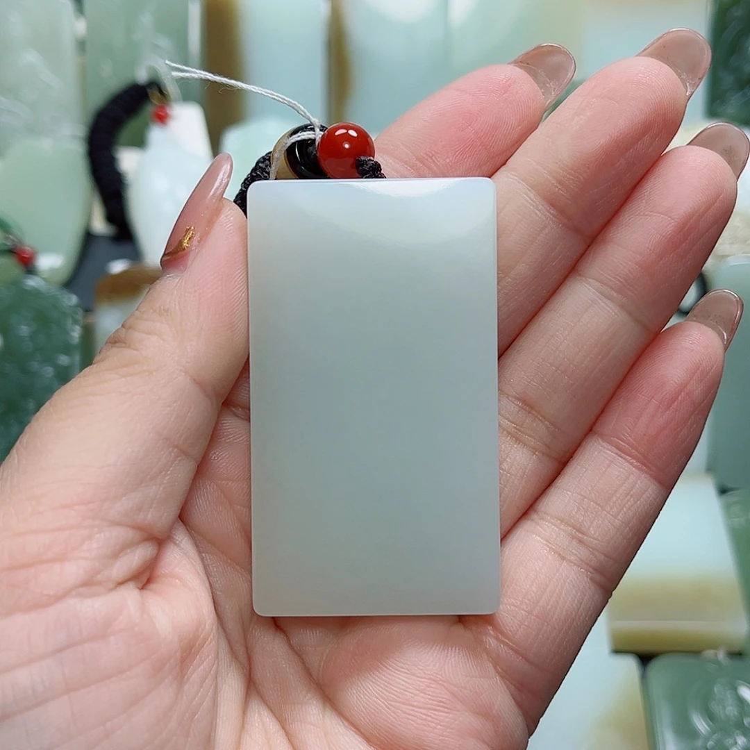 黎***)和田玉未镶嵌颈饰