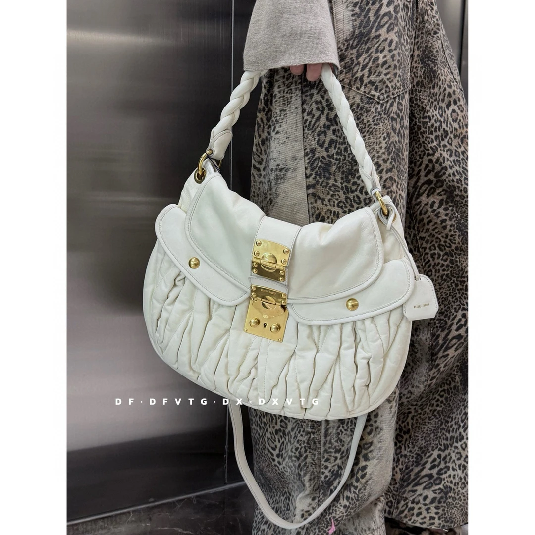 95新 MIU MIU/缪缪 miumiu 白金元宝斜挎包K