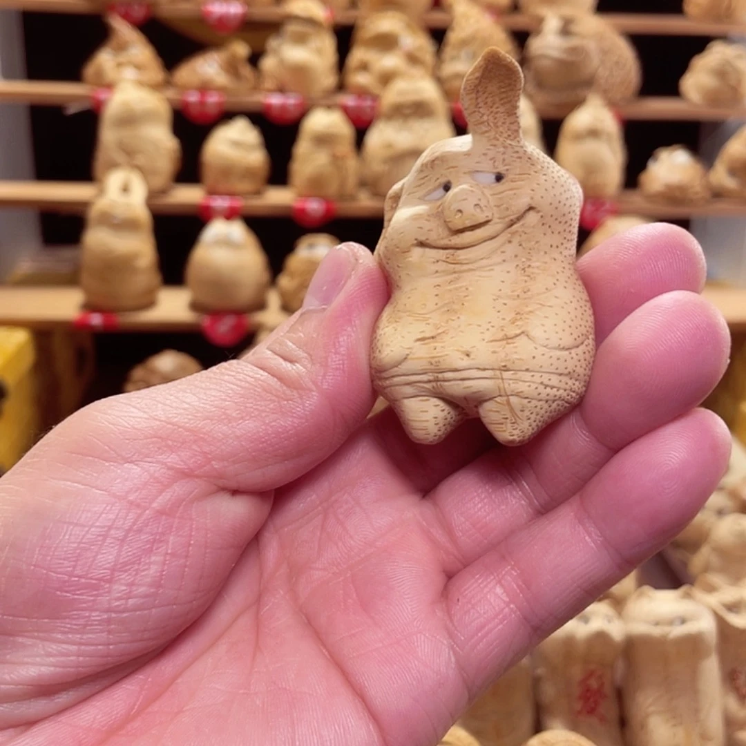竹竹根雕小猪手把件