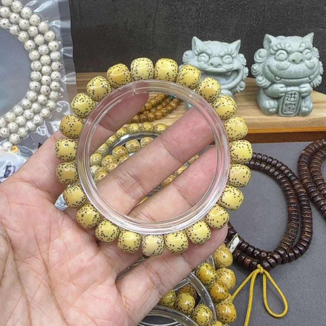星月菩提手串10×9星月菩提侧留白鸡油黄手串