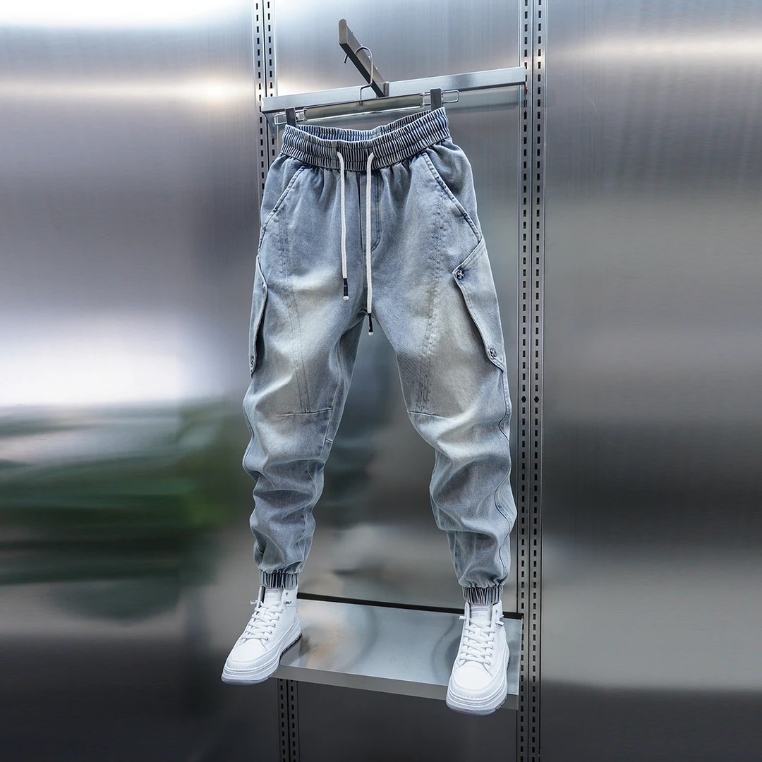 男士新款牛仔裤潮流水洗宽松束脚哈伦裤时尚松紧腰小脚休闲裤