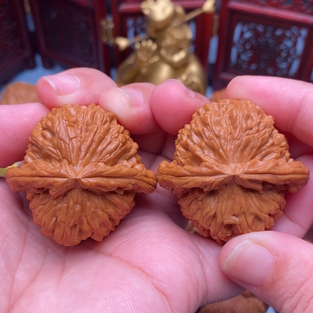 悠***在把件文玩核桃43全白狮子