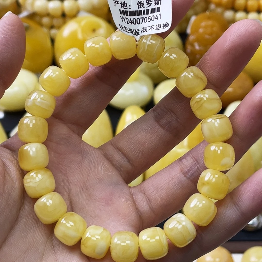 琥珀未镶嵌珠宝奇石喂****？10+mm金妖白浓蜡 微瑕