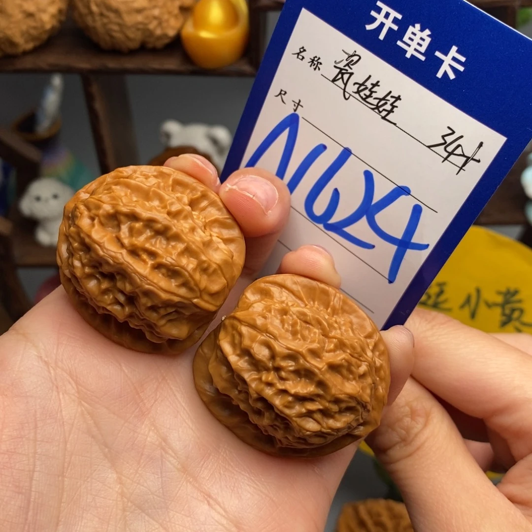 文玩核桃吊坠瓷娃娃