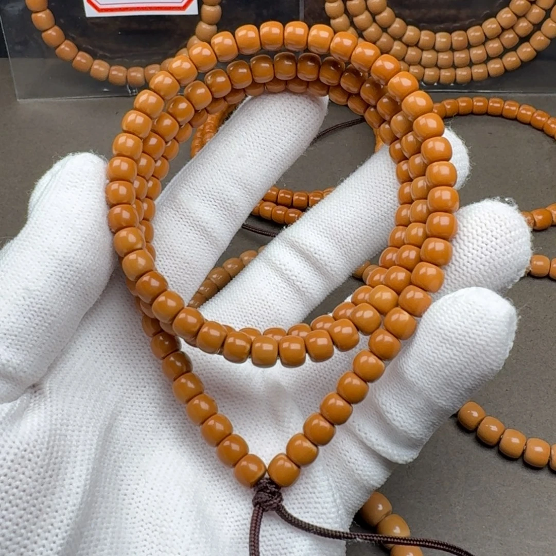 橄榄核吊坠老挝核尖长串 微白