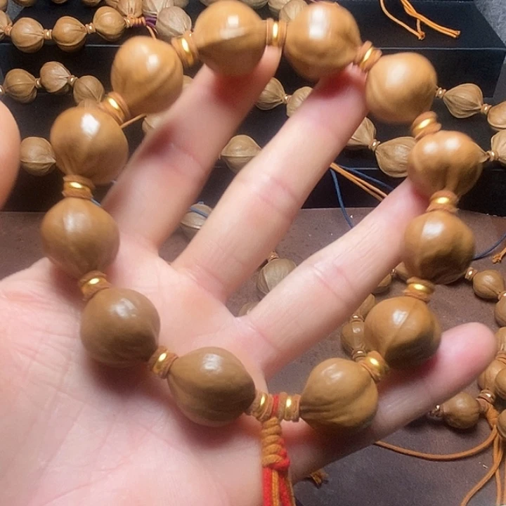 杨***生手串/手链橄榄核小鸟17