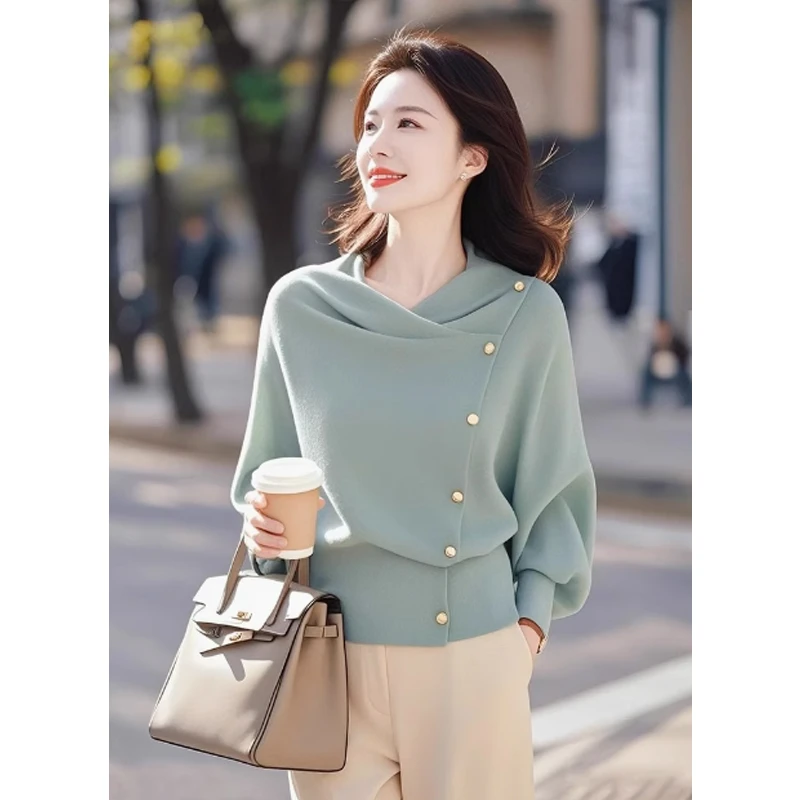 2025春装新款小众不撞款韩系设计感洋气独特别致绿色针织衫上衣女