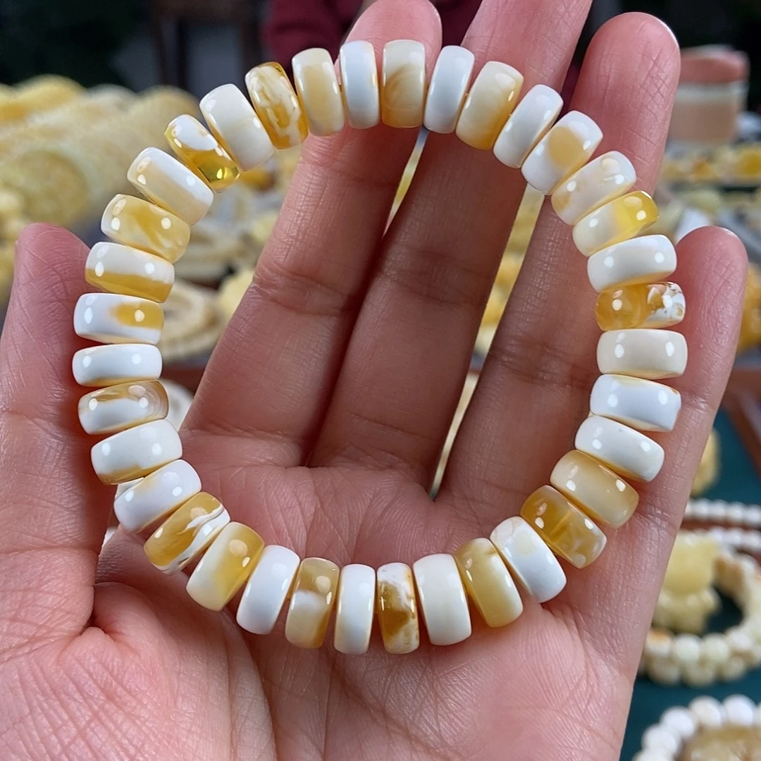 琥珀未镶嵌珠宝奇石11金瓷白溶洞妖隔片手串17.66