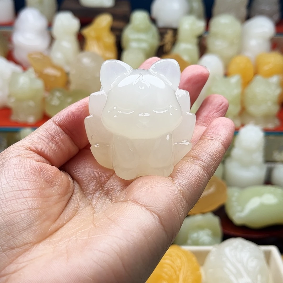 这***点石材九尾狐手把摆件