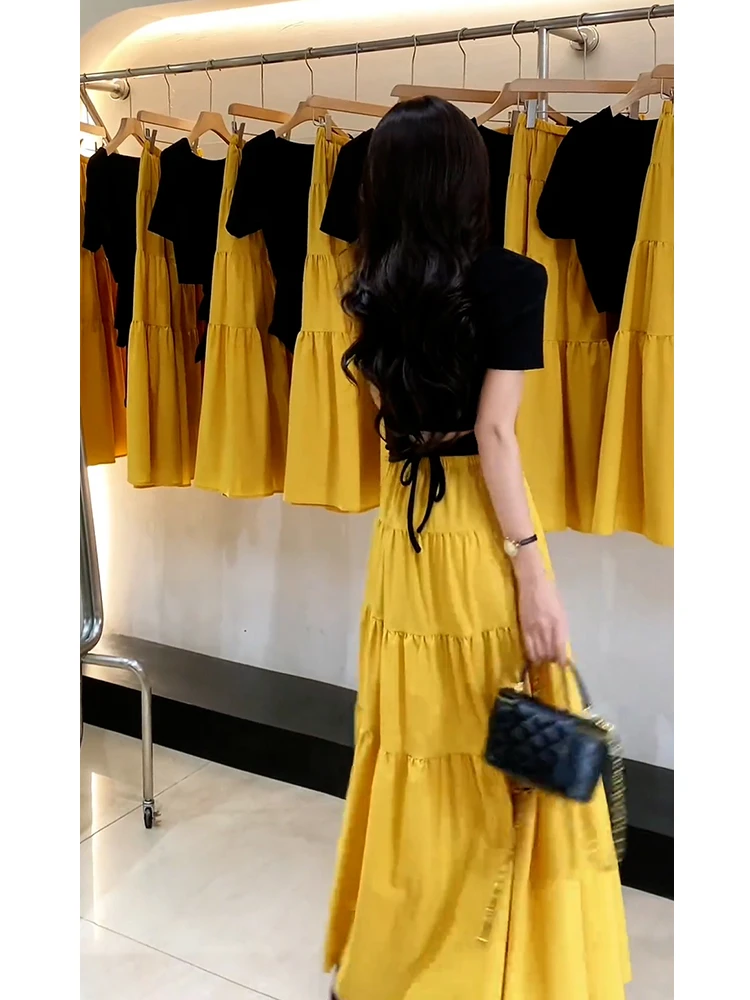 夏日穿搭独特漂亮小香风黑色露腰t恤半裙两件套装女2025新款爆款