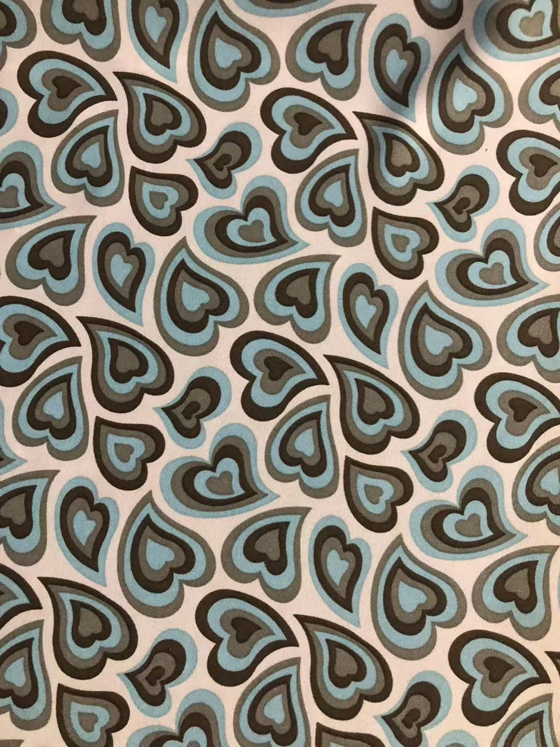 弹力双绉绿色桃心时装面料