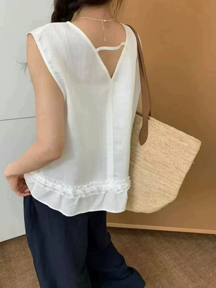 董小姐/ 6825温柔风木耳花边下摆无袖背心上衣