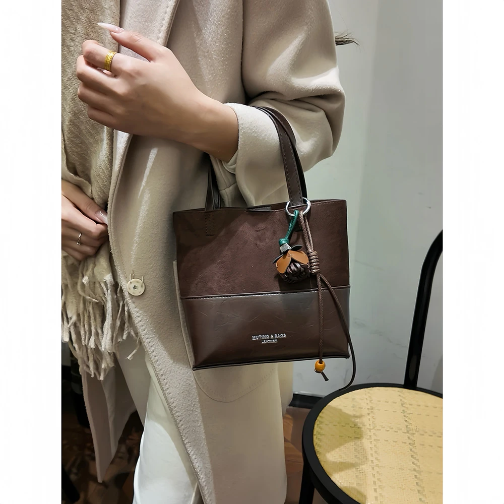 小众复古包包女2025新款麂皮水桶包韩版爆款通勤斜挎包时尚单肩包