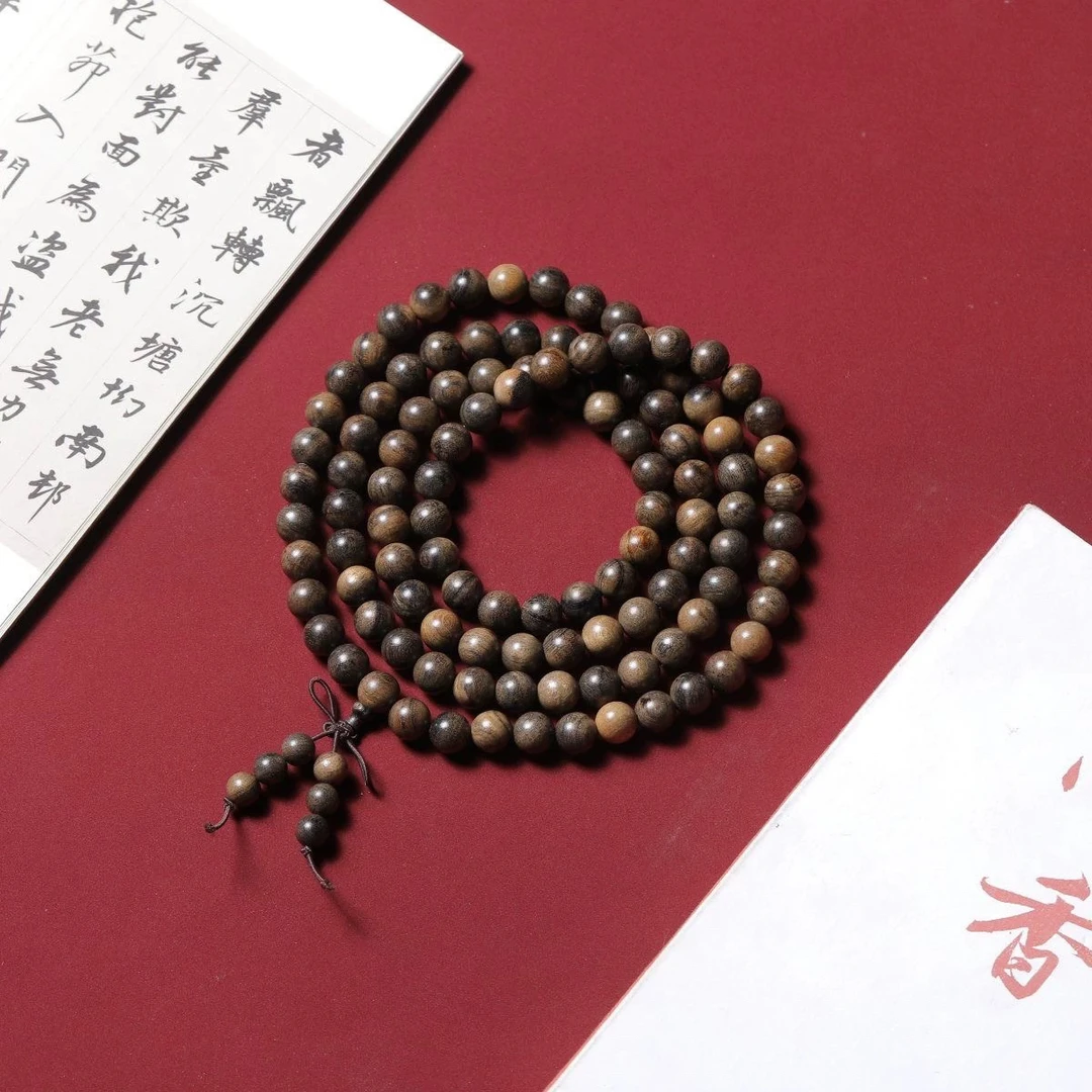 沉香木雕0.8-108颗-越南沉香木雕多圈手链挂件