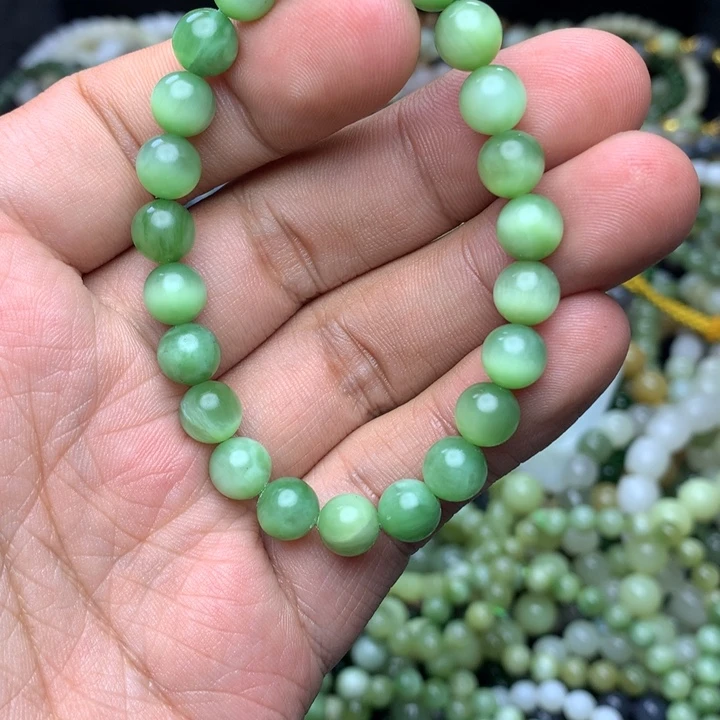 了****和田玉未镶嵌手串黑羊洞