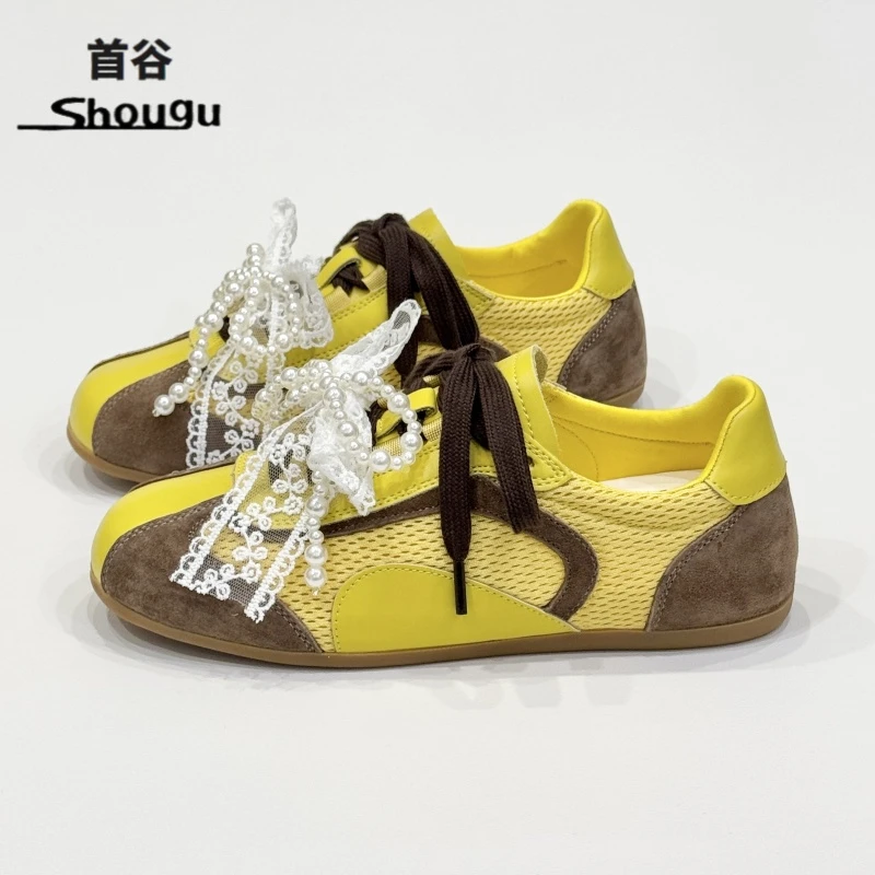 shougu/首谷双色带德训鞋女2025夏软底串珠蝴蝶结网面阿甘休闲鞋