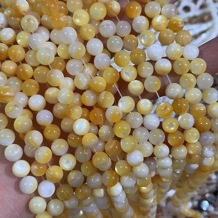 7mm黄金贝圆珠一条