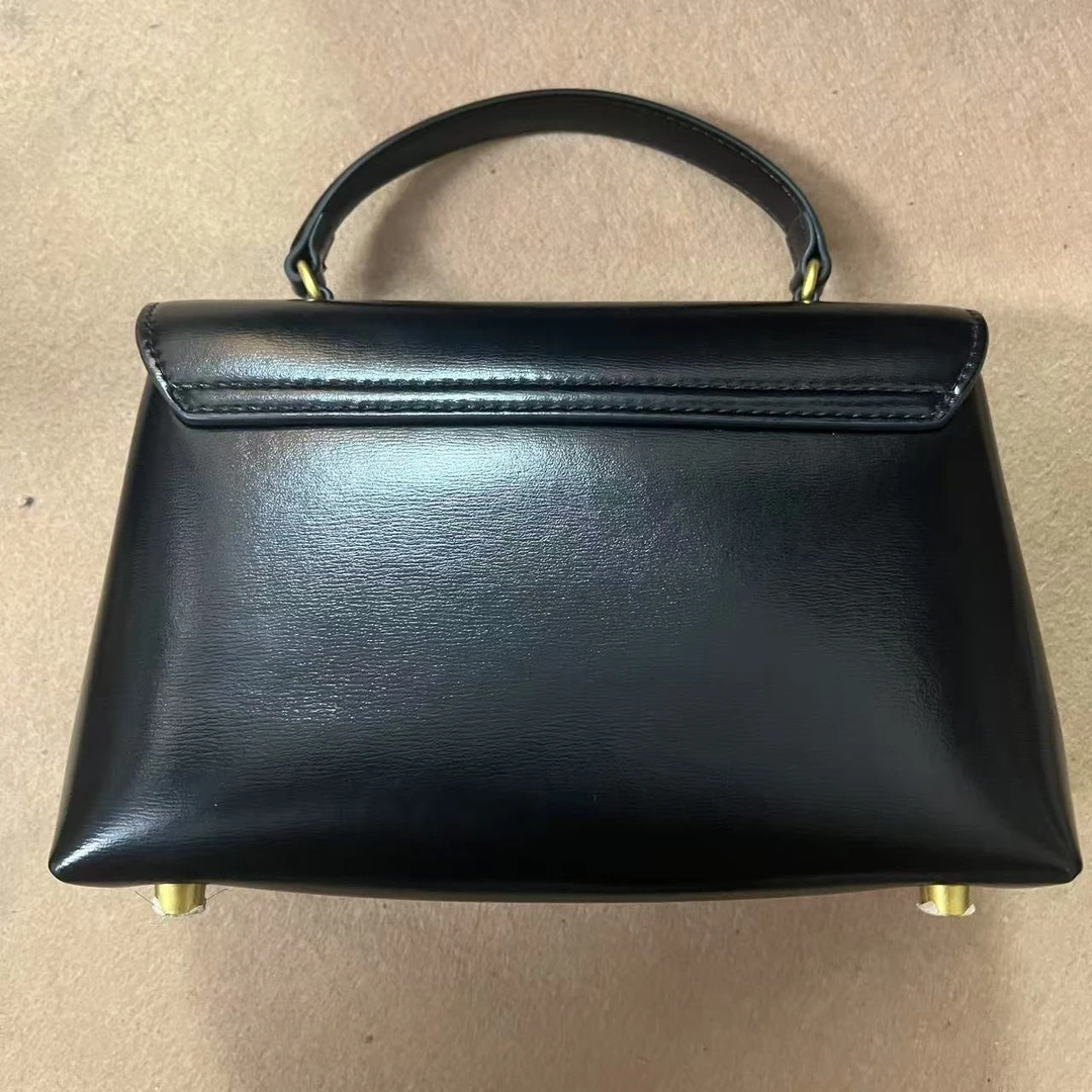 TOLEX2025新款手工时尚手提百搭真皮女包梯型k黑色21cm
