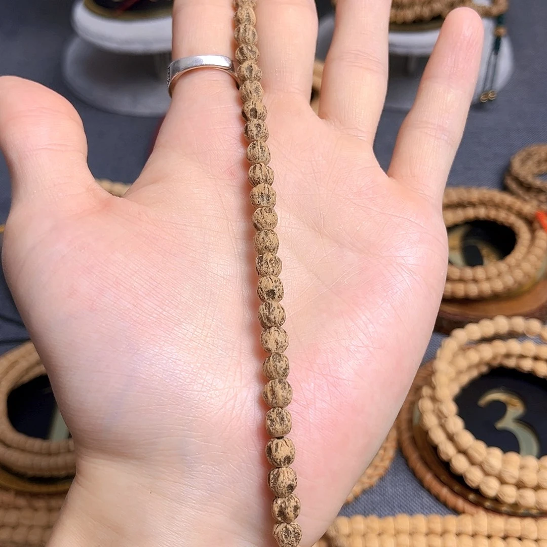 柏香籽/百香籽吊坠摩***萨