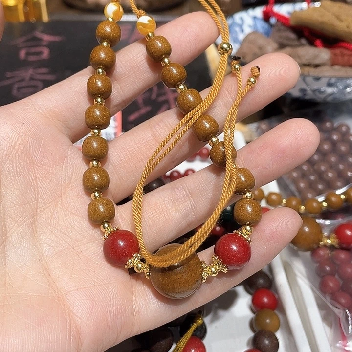 泥塑合香珠多变链花神