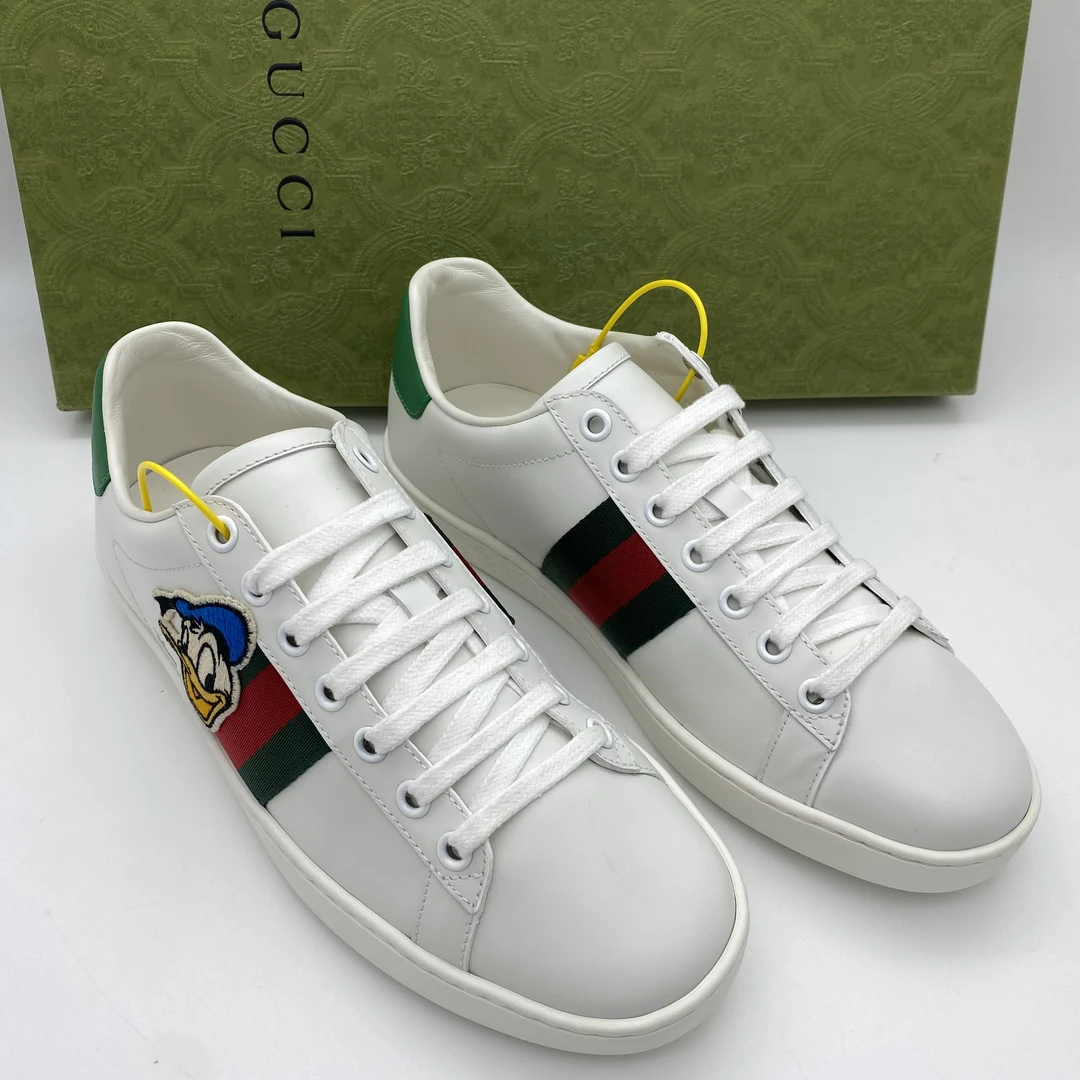 95新 GUCCI/古驰 /37欧码/男士 白色唐老鸭刺绣休闲板鞋