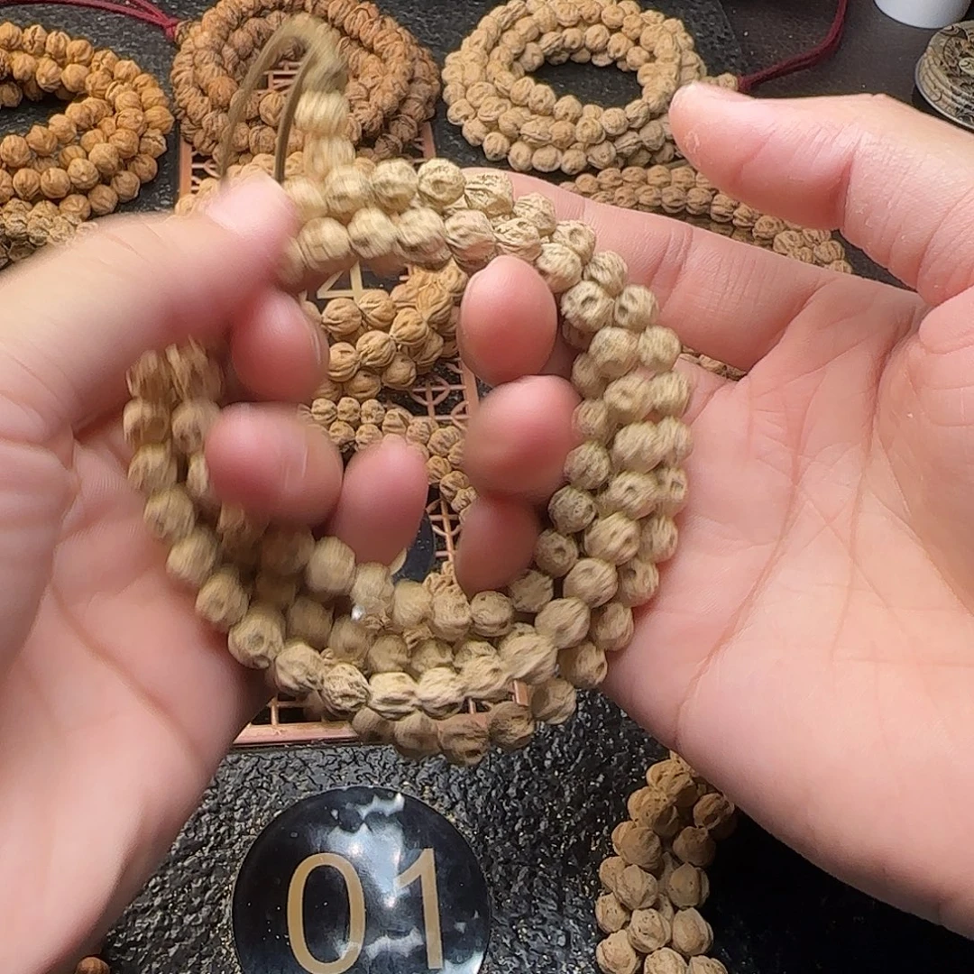 蠡***子柏香籽/百香籽吊坠