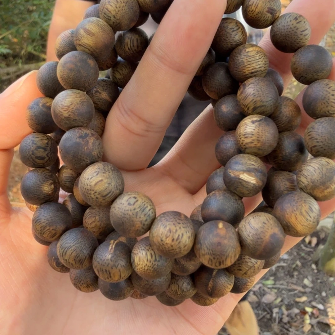 沉香碎屑沉香海南红骨凹身瘤疤圆珠10*10 多样性发一