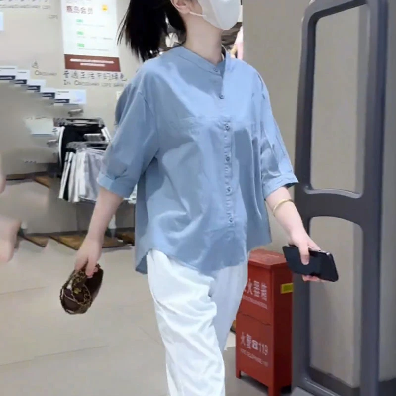 2025新款蓝色立领衬衫女夏季宽松显瘦时尚减龄职业气质五分袖上衣