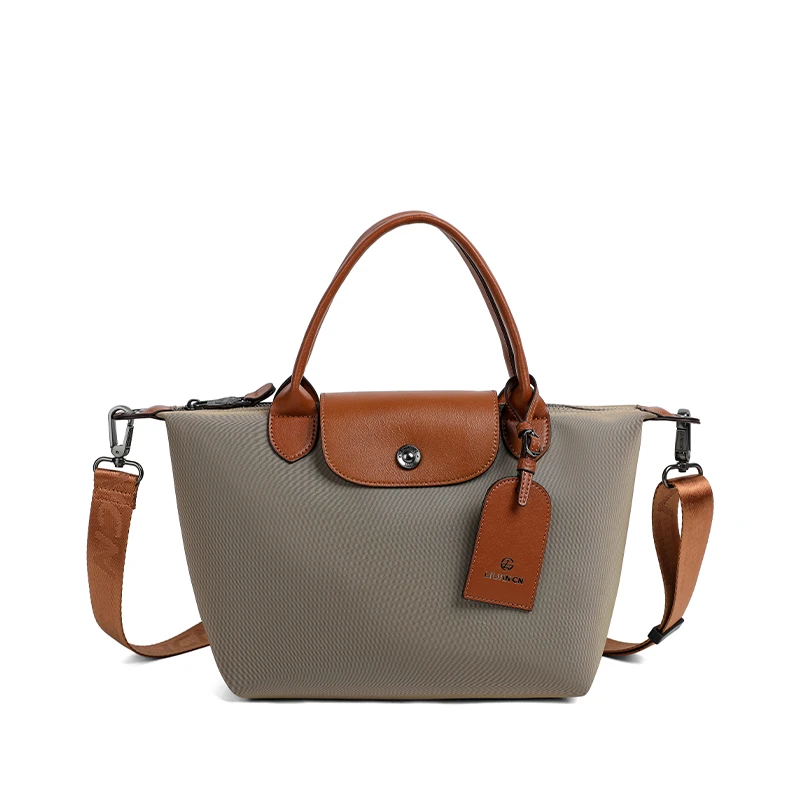 六京城轻奢单肩包复古女包肩包饺子包斜跨牛仔风朋克风