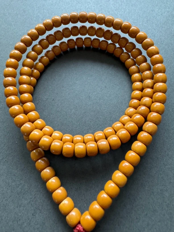 橄榄核核尖脖挂长串尺寸5.4mm 130颗  漏微白