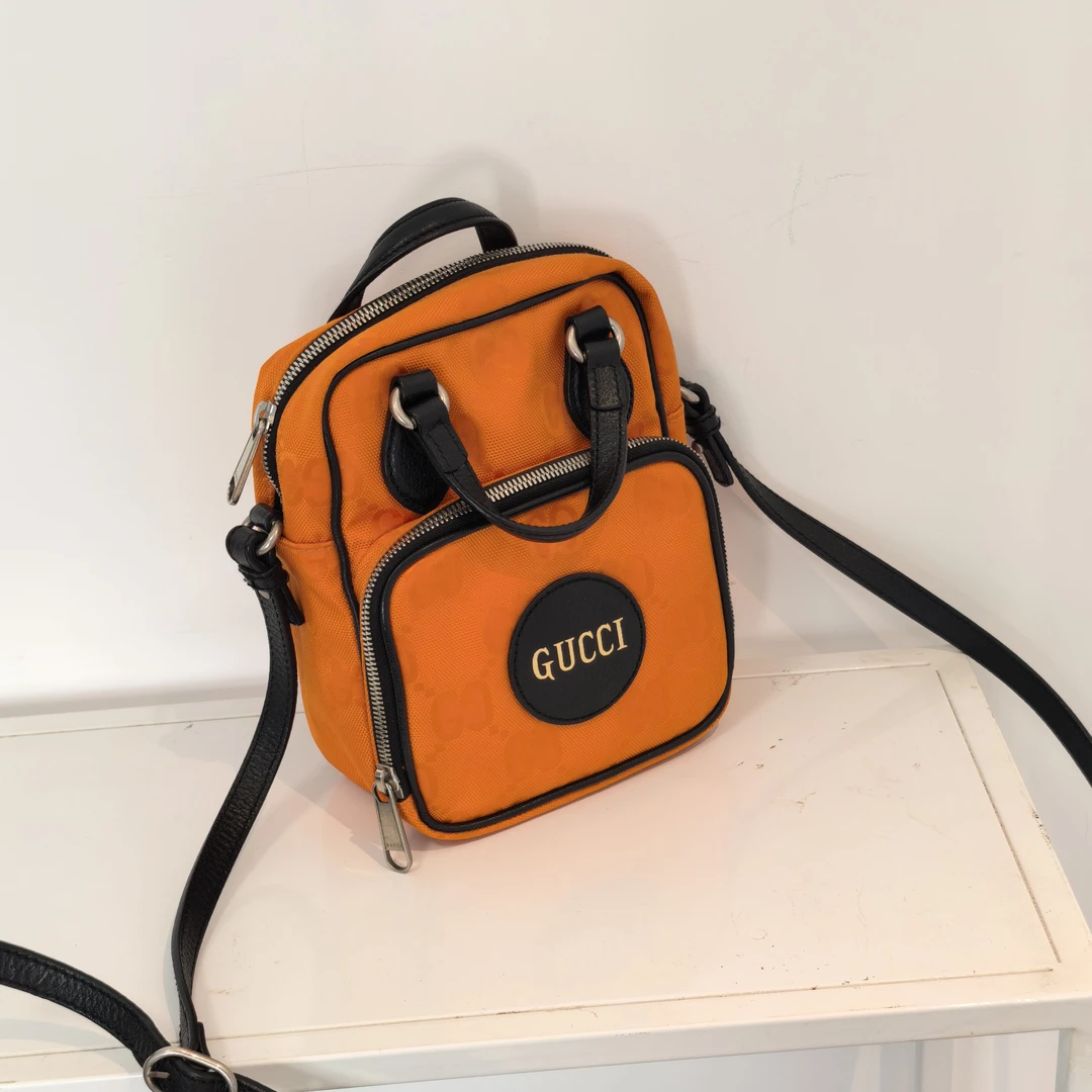 95新 GUCCI/古驰 兜兜 橘色logo手提斜挎包
