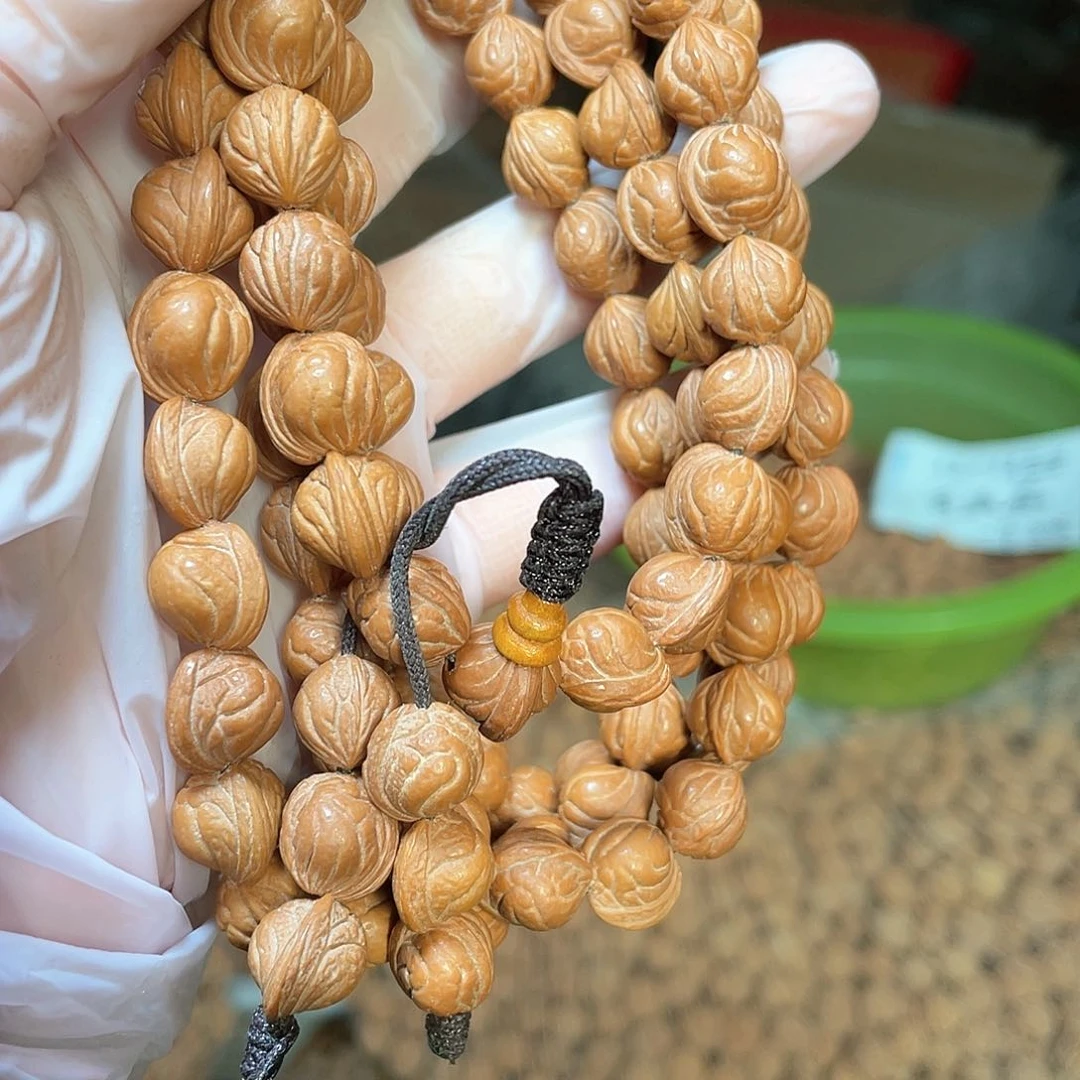 桃核吊坠我*?浅纹长的小金豆