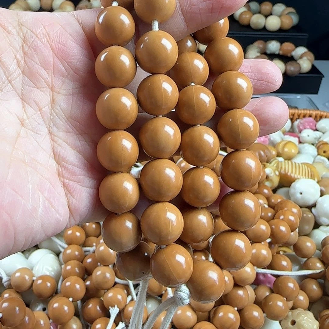 菩提根/象牙果手串瑕疵卡13.6龙岩料猴头圆1串