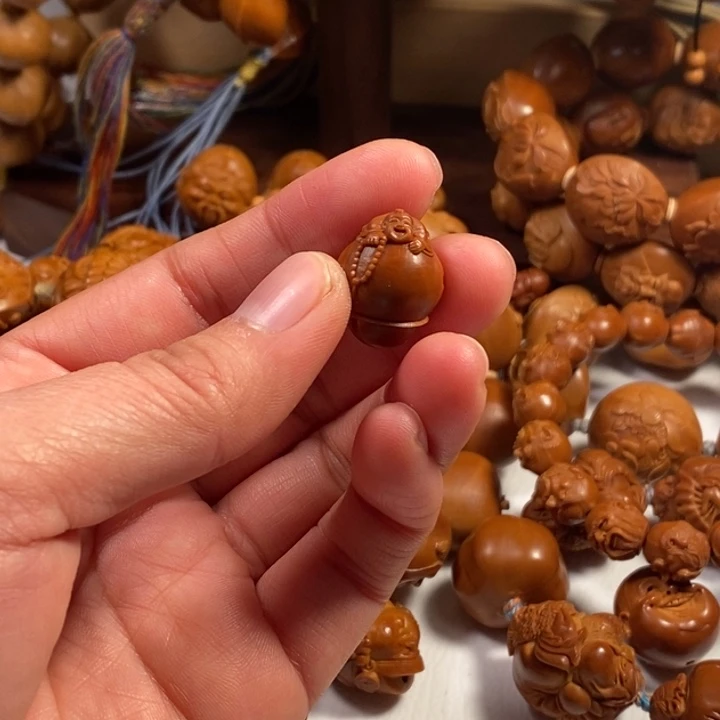 橄榄核手串/手链㞢**㑅三通