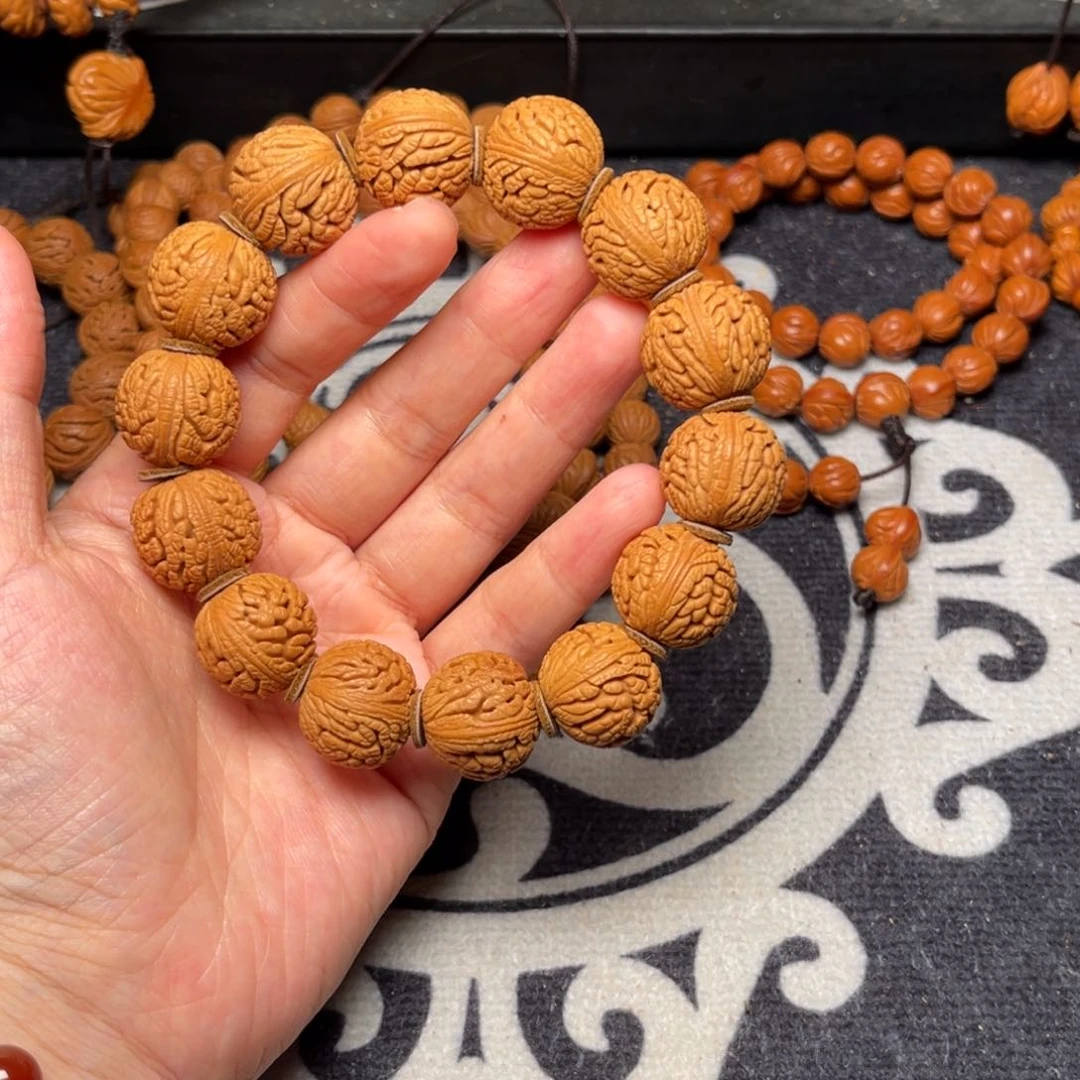 桃核手串龙纹绣球18