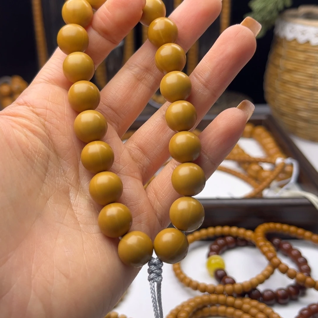 橄榄核吊坠猴头手持