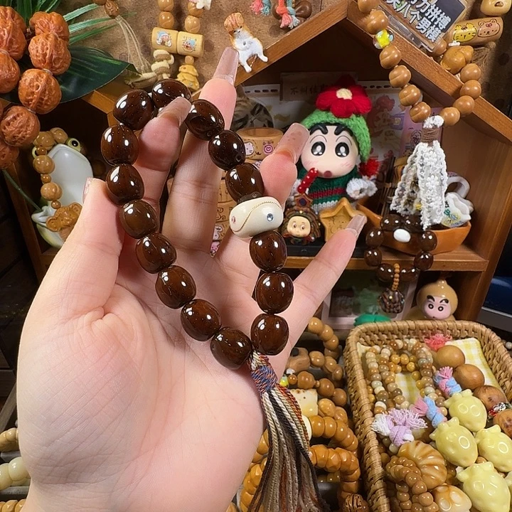 柏香籽/百香籽吊坠招财鼠手持（紫金鼠）