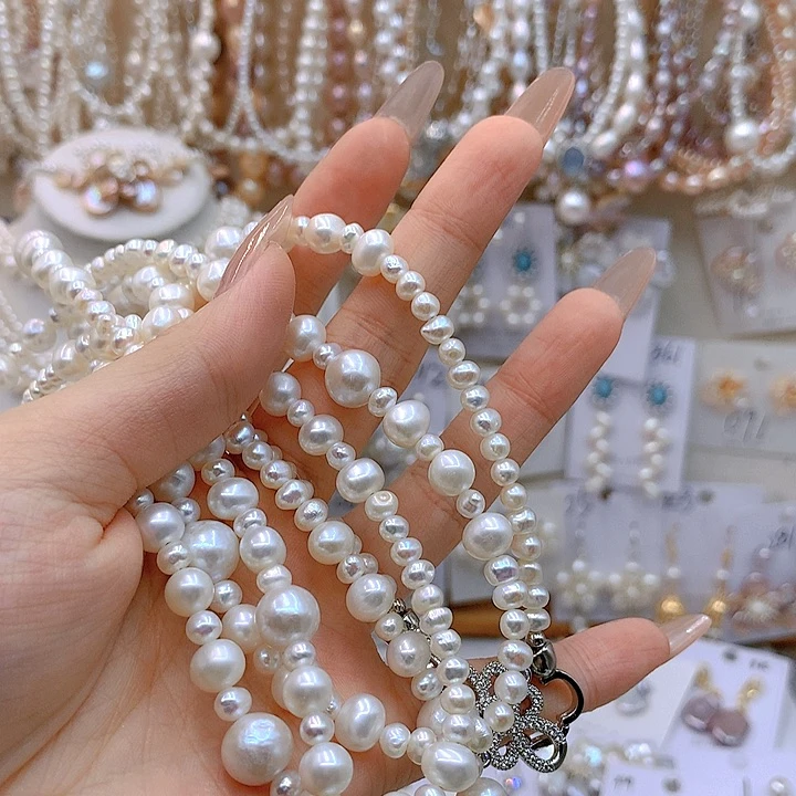 银S925镶嵌淡水珍珠发饰活**己