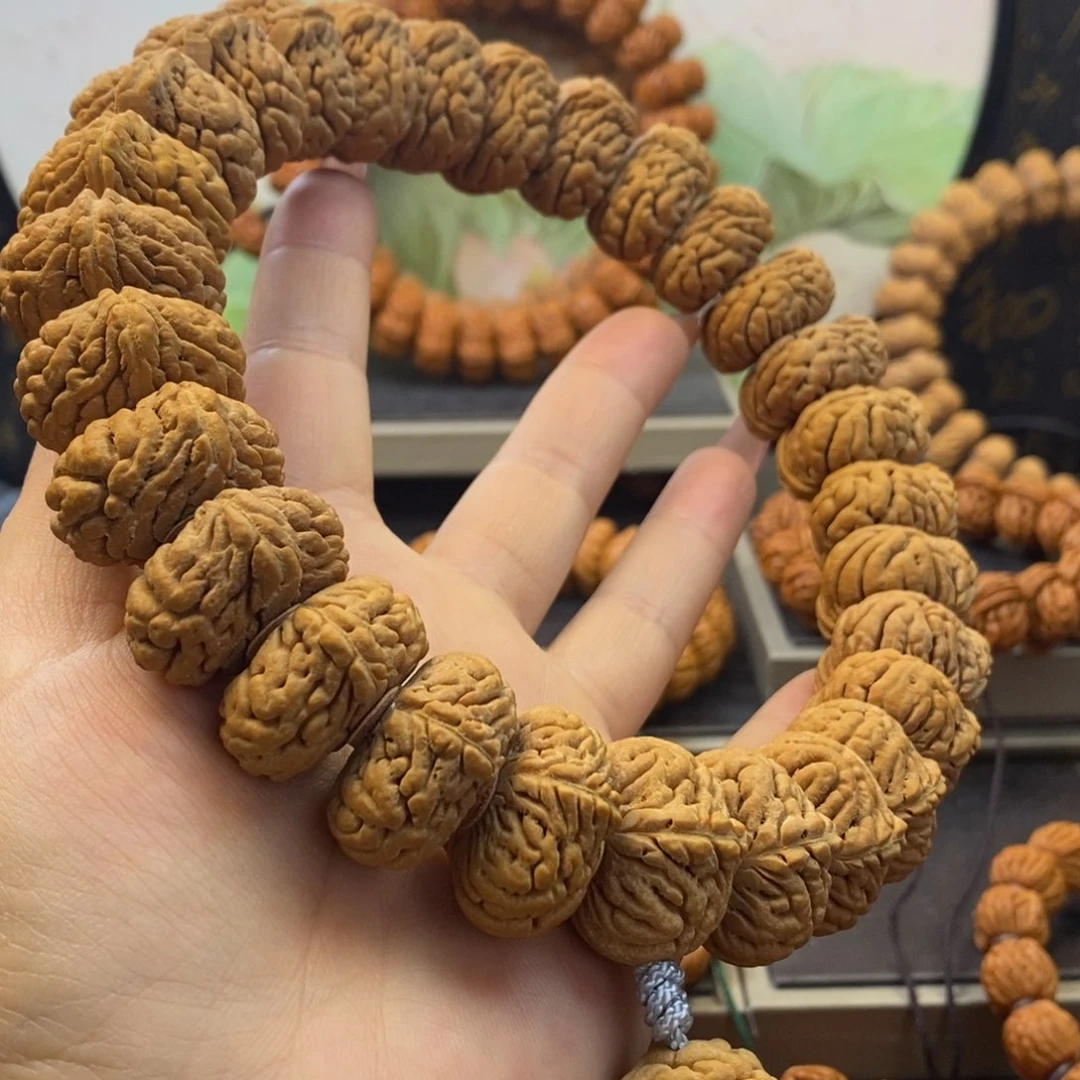 桃核手串龙纹桃核麒麟