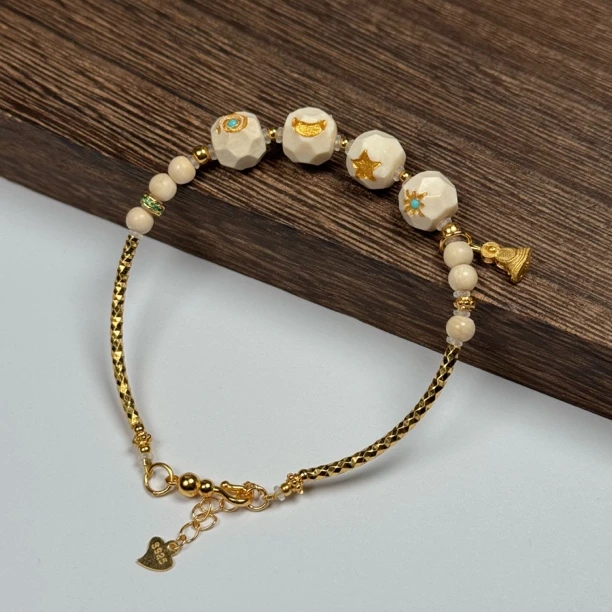 Q42-53天然猛犸牙 日月星辰设计款手链约8.5mm