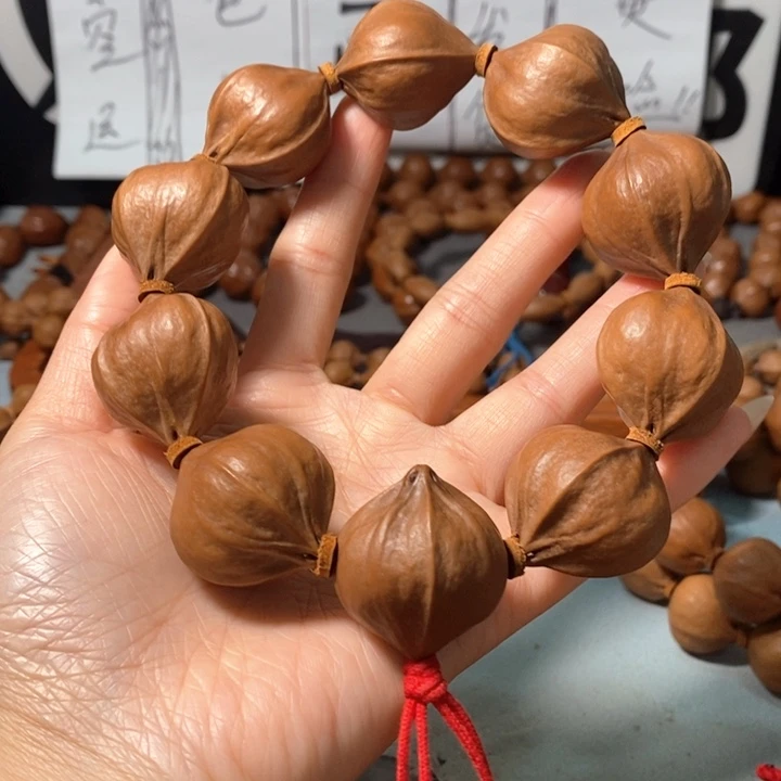 橄榄核手串0382精品4花老树王蒜头铁核9+1颗