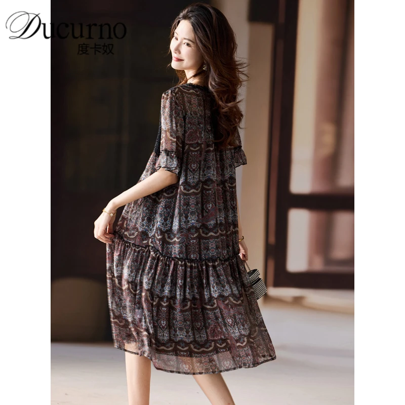 洋气拼接印花雪纺连衣裙女2025年大码A字裙夏季新款度假风裙子