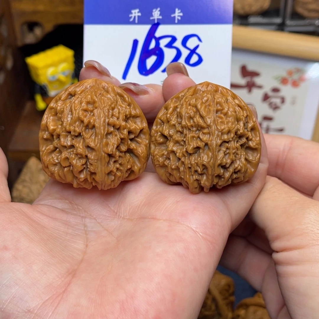 桃核把件三角疆41。精修李。