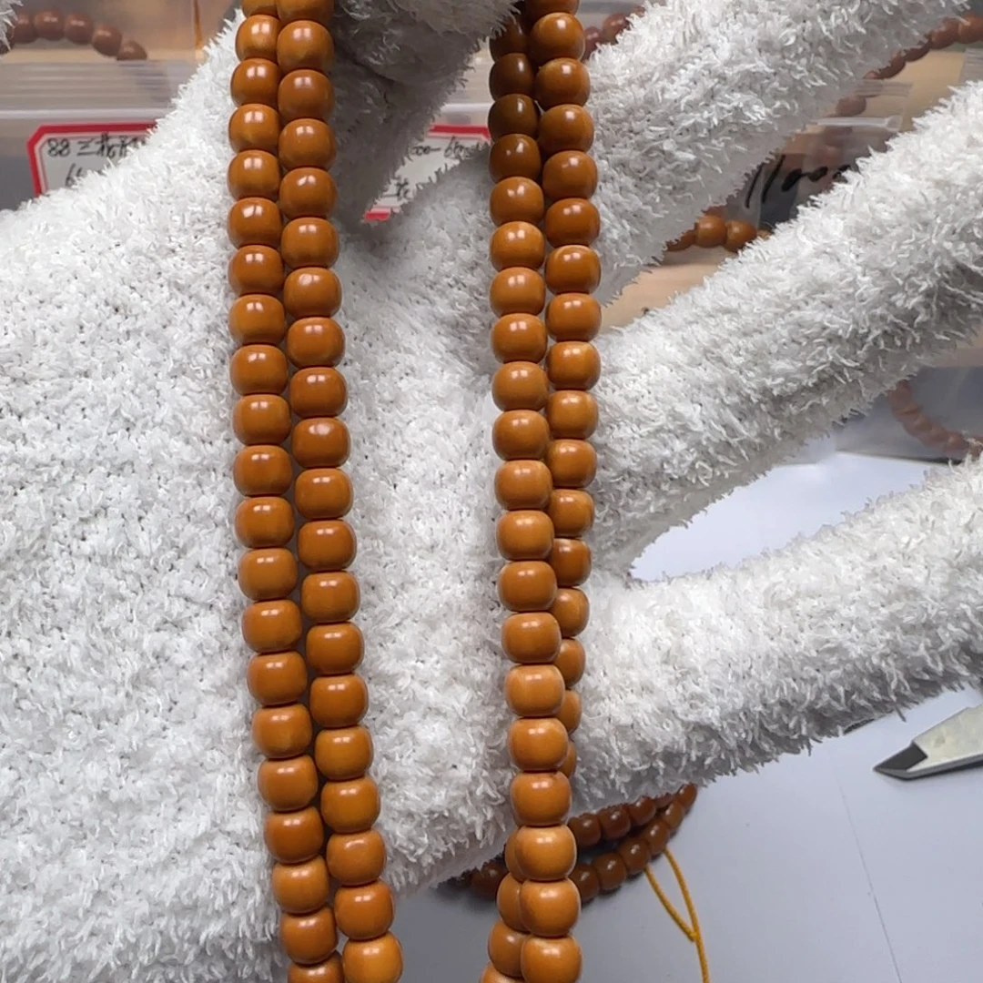 橄榄核吊坠老挝6.6mm老型长串
