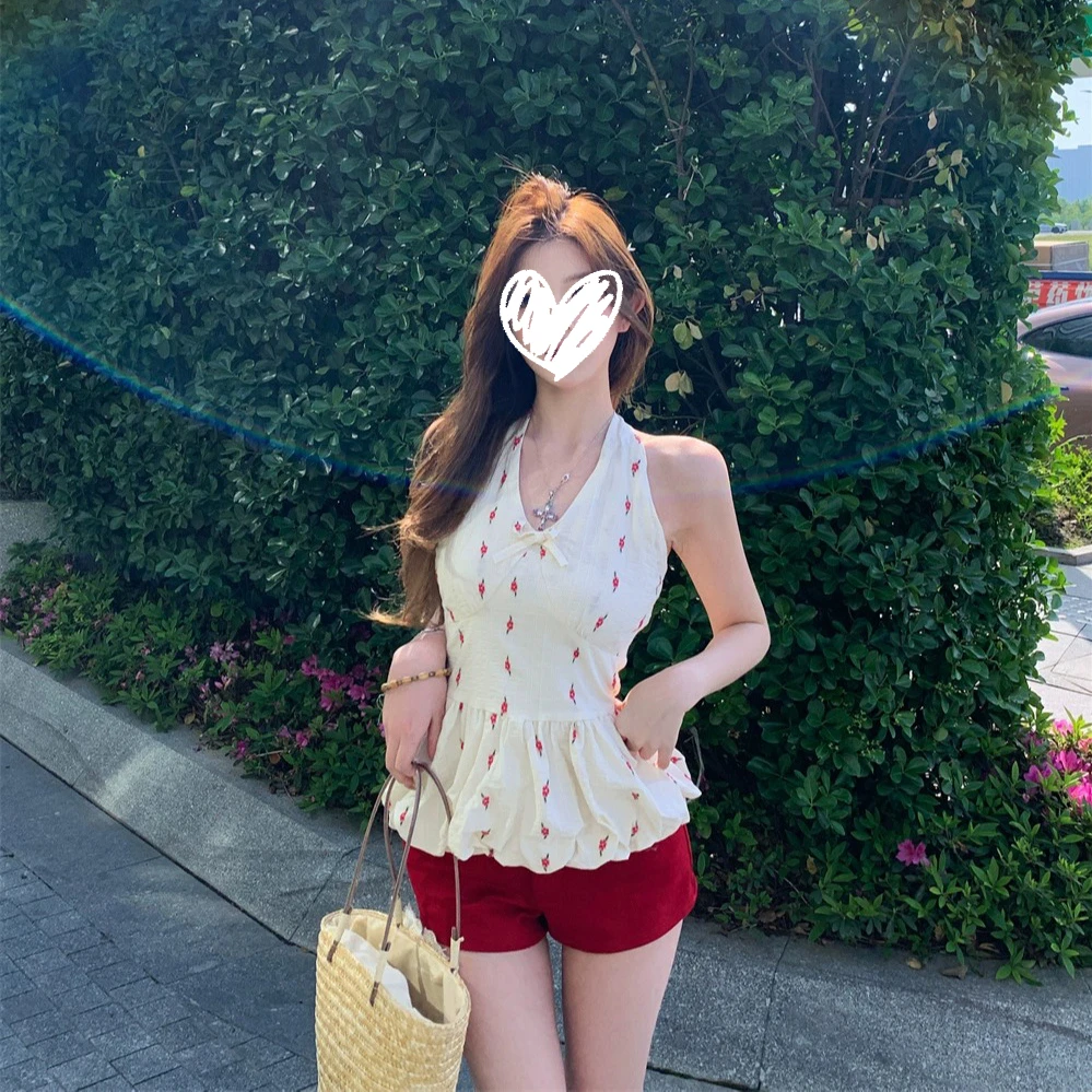 度月棠2025夏季新款法式甜美芭蕾风碎花挂脖背心女花苞下摆上衣
