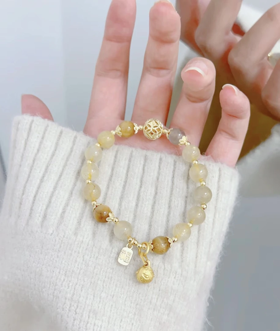 灰金发女款2025隔珠天然吞金晶手链新款月光兽黄水晶虎眼石手串